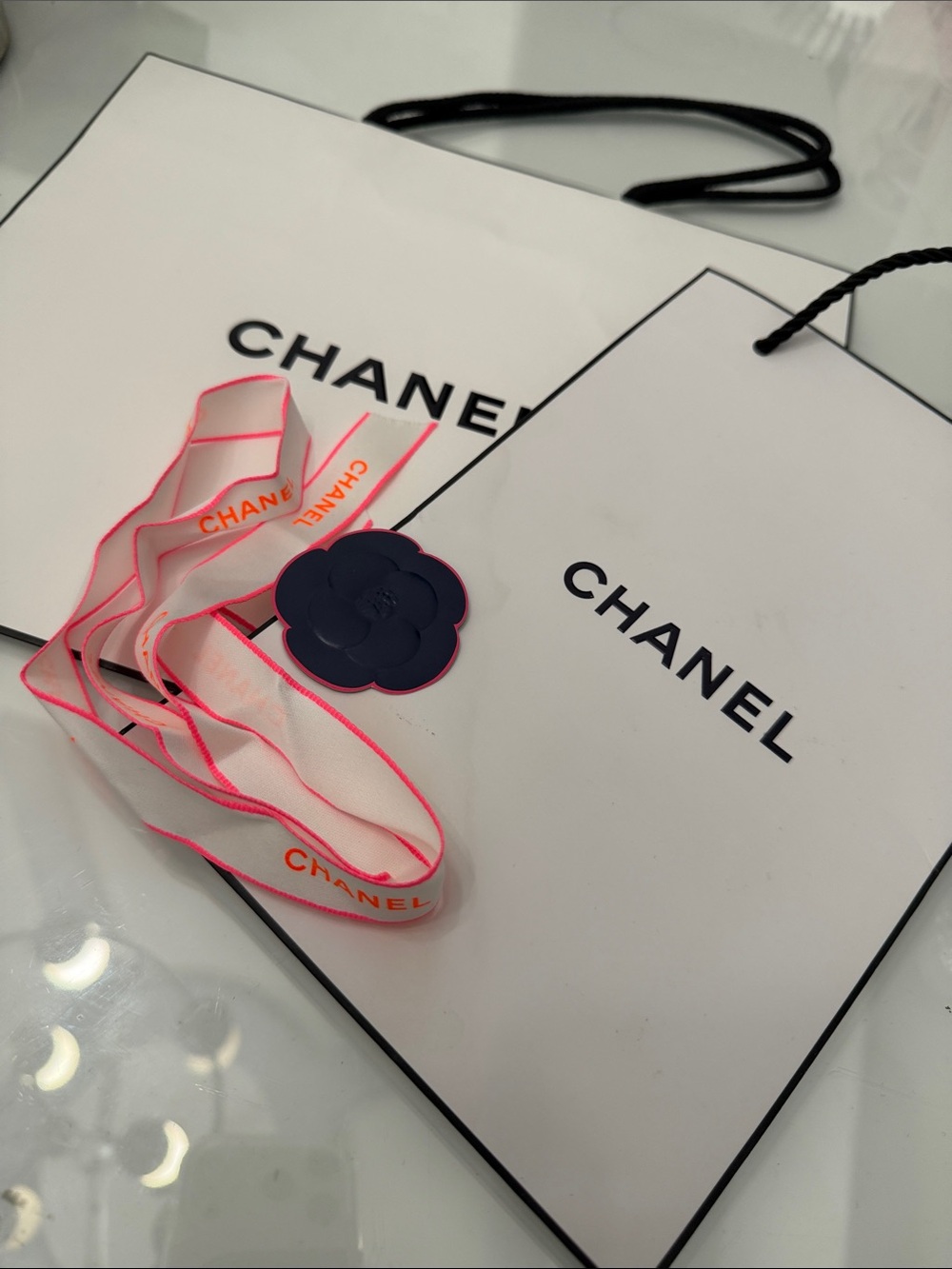 Set of 2 CHANEL gift bags with Neon Pink Ribbon with Navy Camellia Tag